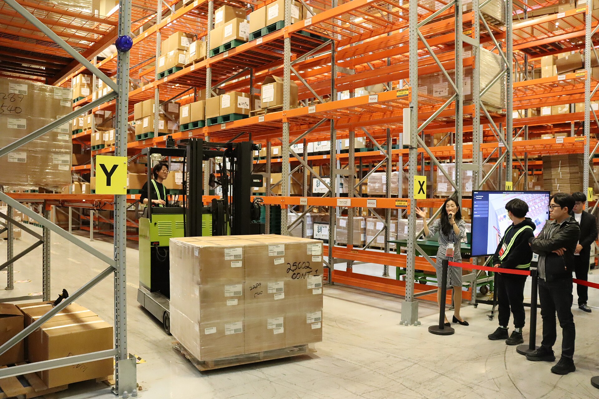 Warehouse racks and boxes in a supply warehouse